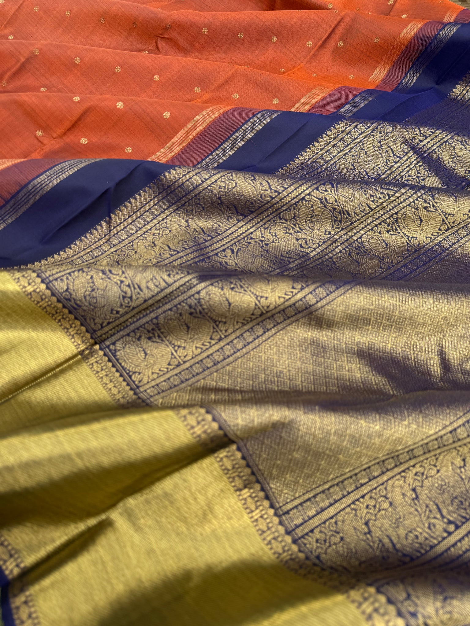 Molten Play on Kanchivaram - stunning Molten Metallic rusty caramel brown and navy blue with grander version of pallu and borders