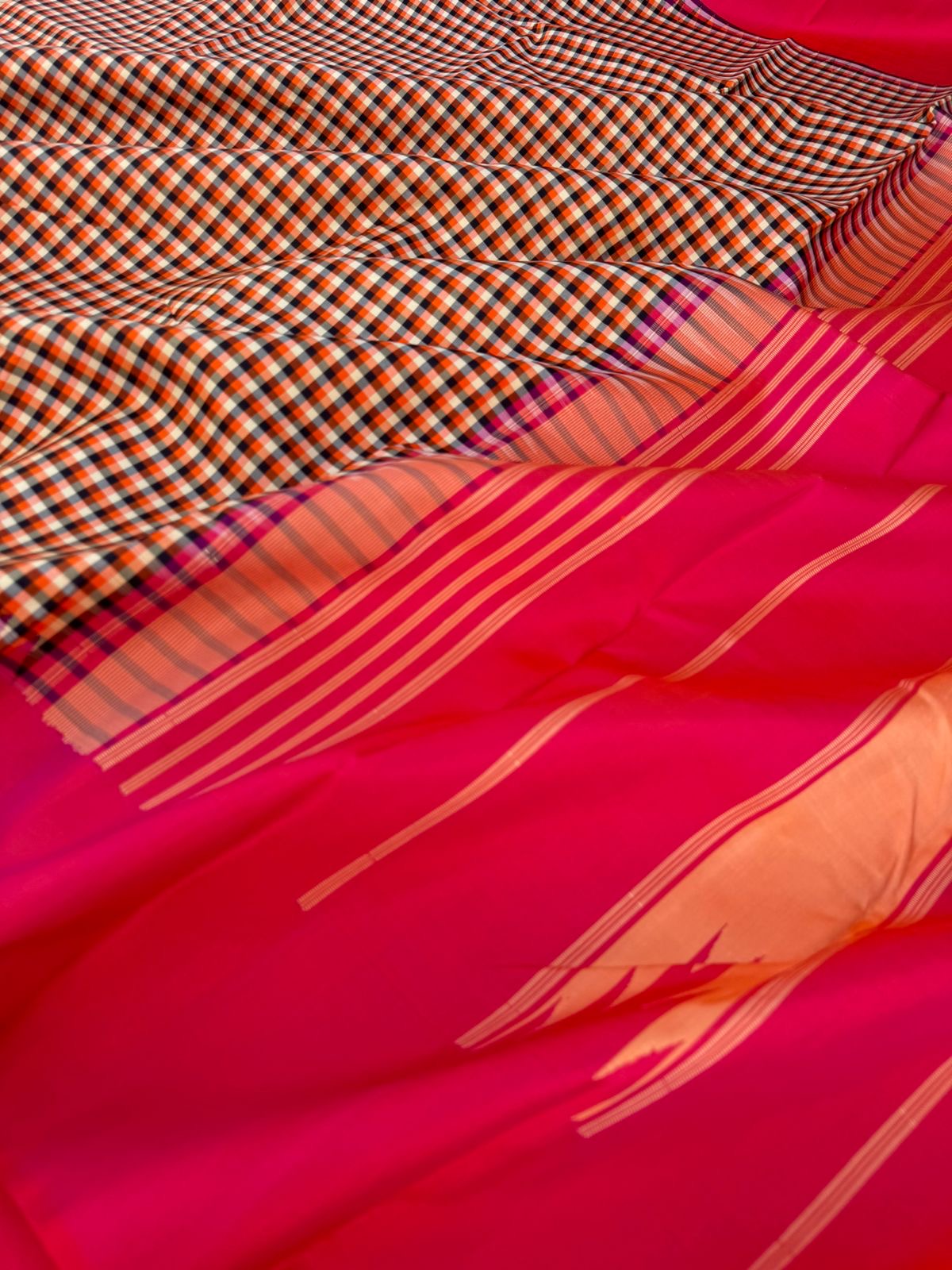 Rarest Korvai Kanchivaram - the body has tiny off white, orange, black chex with orange mixed pink Korvai woven borders
