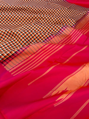 Rarest Korvai Kanchivaram - the body has tiny off white, orange, black chex with orange mixed pink Korvai woven borders