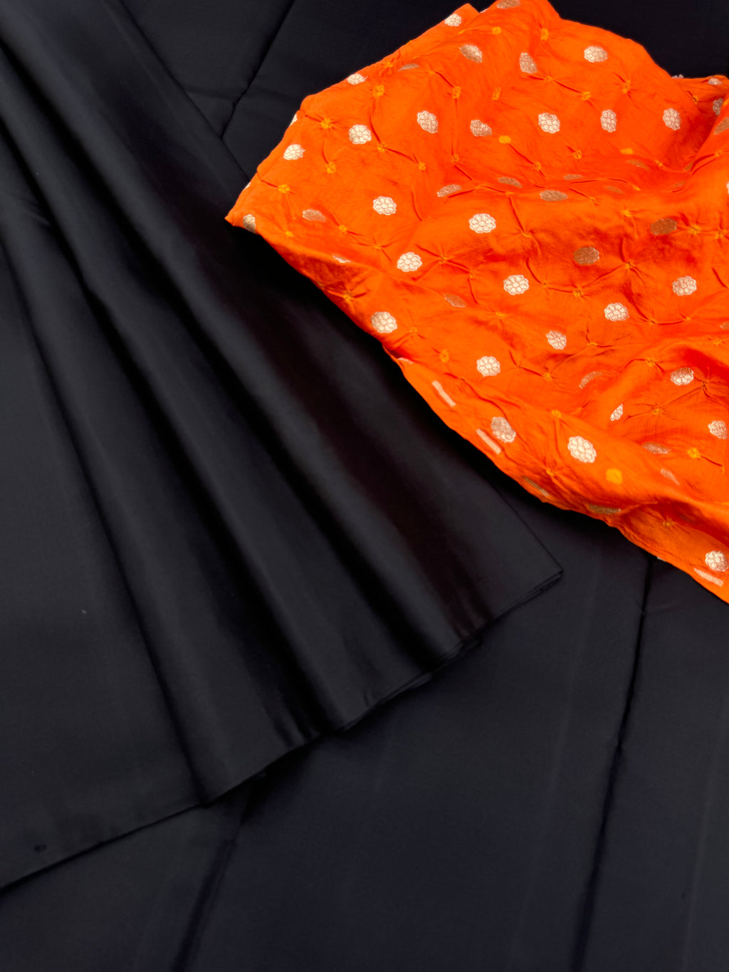 Niram - Celebrating of Full Plain Kanchivaram Silks Paired with Beautiful Blouses - black saree with orange silk bandhani blouse