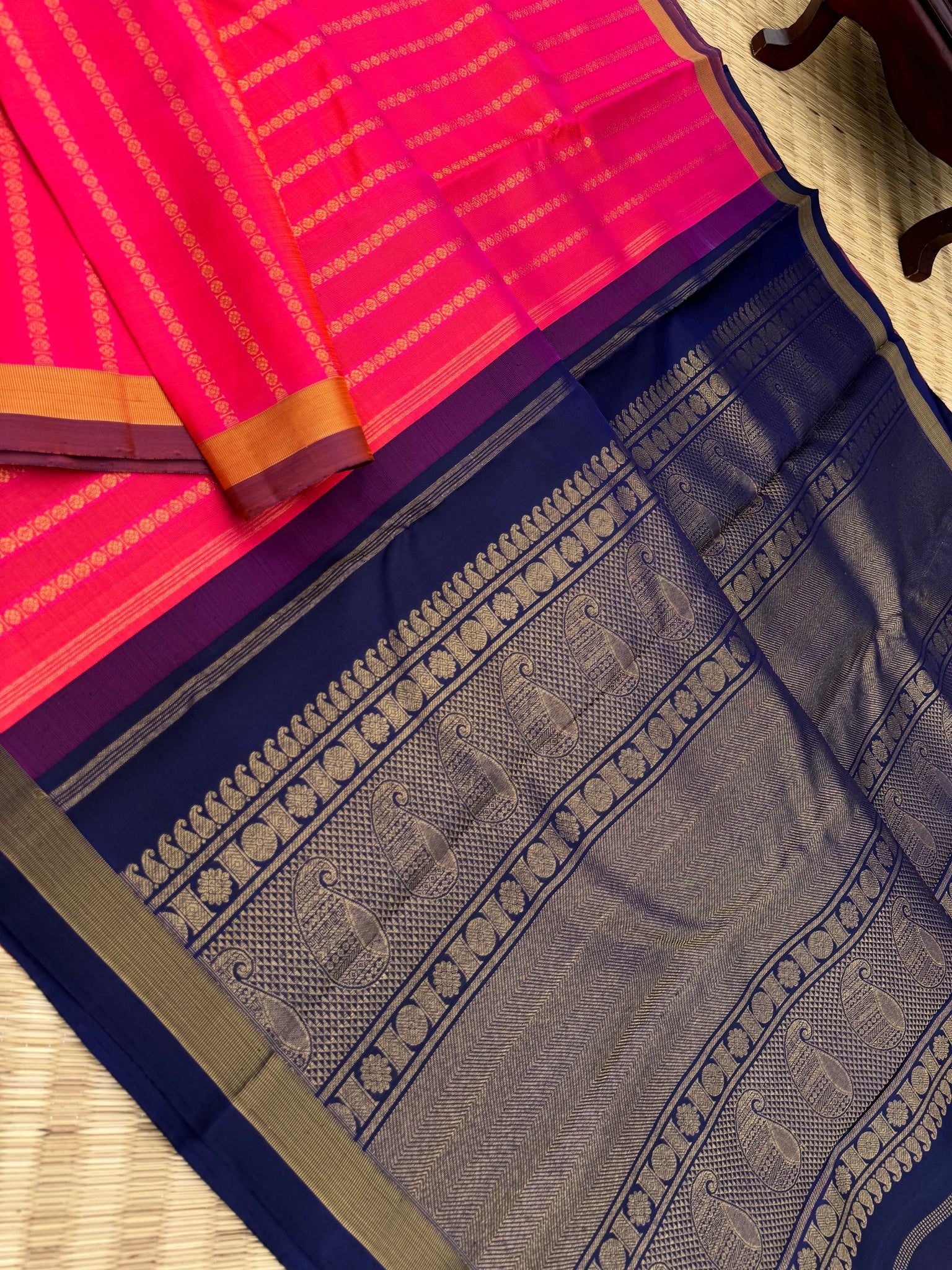 Album Untouched - a stunning orange mixed pink dual tone rudurakasham woven vertical veldhari with deep navy blue pallu and blouse