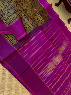Haritham - Heirloom Yarn Play on Kanchivaram - a black and beige 1000 buttas with majenta pallu and blouse