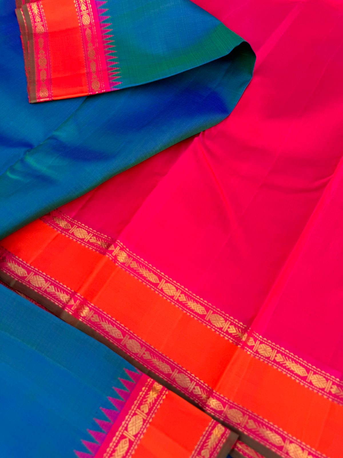 Kamakshi - Heirloom Korvai Kanchivaram - the best of best peacock blue body with orange pink borders and pallu