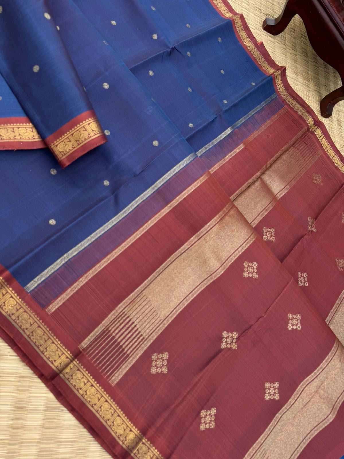 Leela - The bliss of small border Kanchivarams - rusty blue a unusual and rare tone with gorgeous chocolate tone pallu and blouse