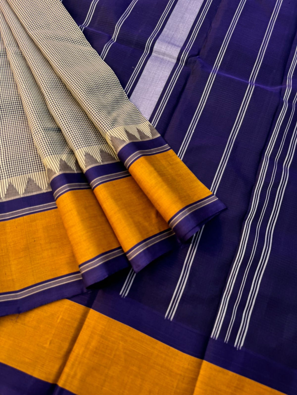 Signature Silk Cotton -English kasa kasa kattam with deep navy blue pallu and blouse