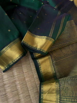 Swarnam - Stunning Solid Border Kanchivarams - the deepest dark green !! Ruby, gold and diamond will be super gorgeous with this saree !
