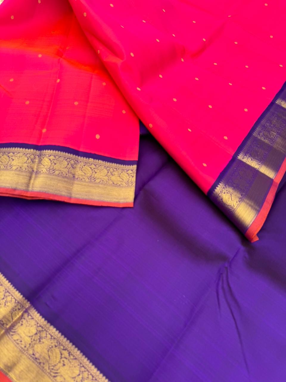 Meenakshi - Heirloom Korvai Kanchivaram - a beautiful kanakambaram pink mixed orang tone with deep ink violet yali pallu