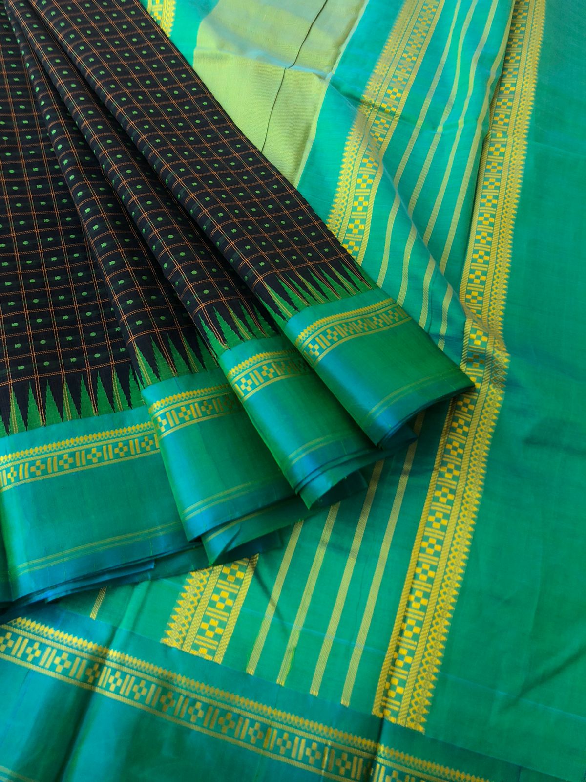 Mira - Our Exclusive Cotton body with Pure Silk Korvai Borders - mid night black blue and teal Lakshadeepam with Chettinad style pluse motifs woven borders