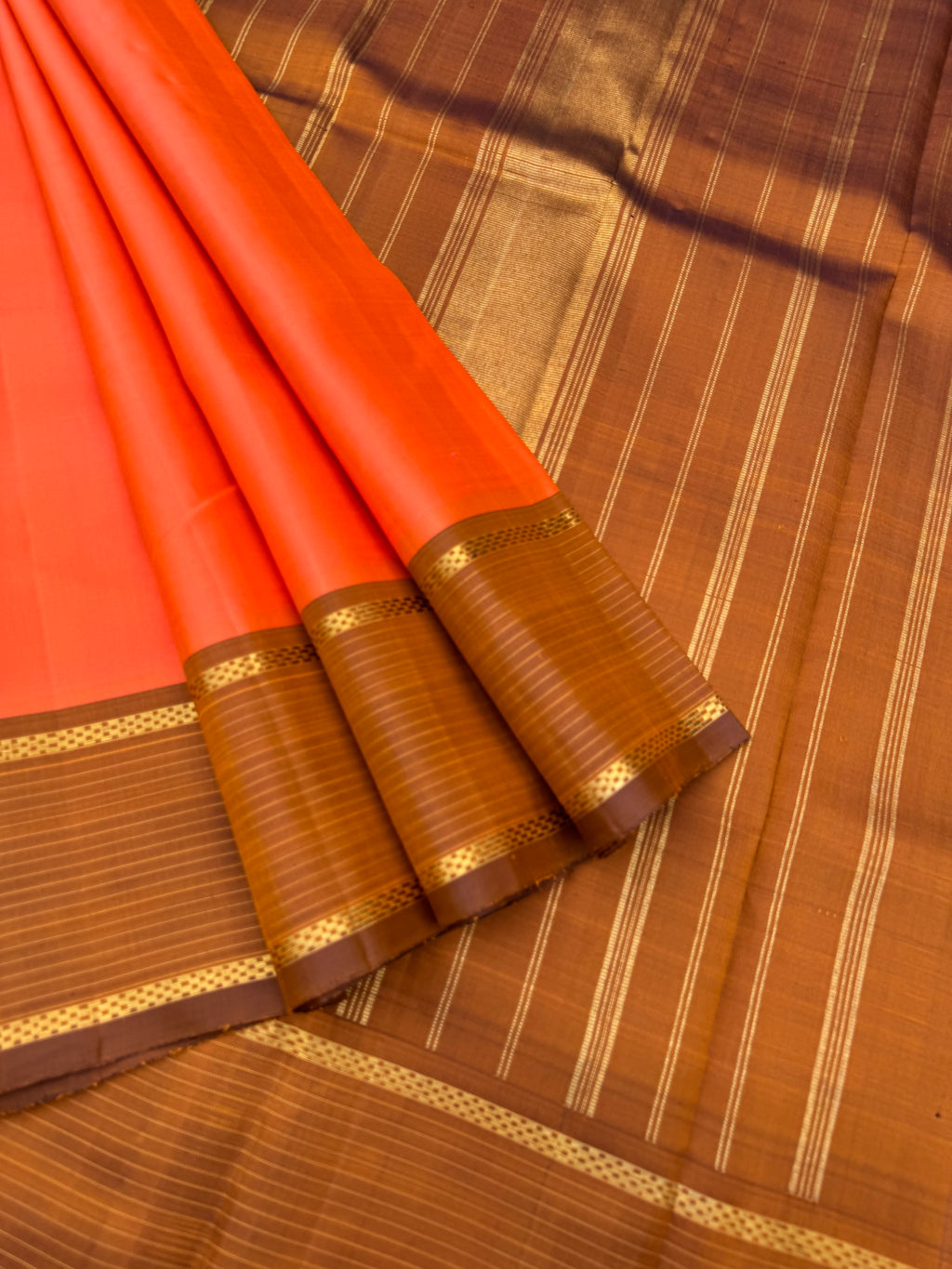 Diwali Edits - Kanchivaram For All Occasions - a unique shade of kanakambaram orange and caramel tone borders pallu and blouse