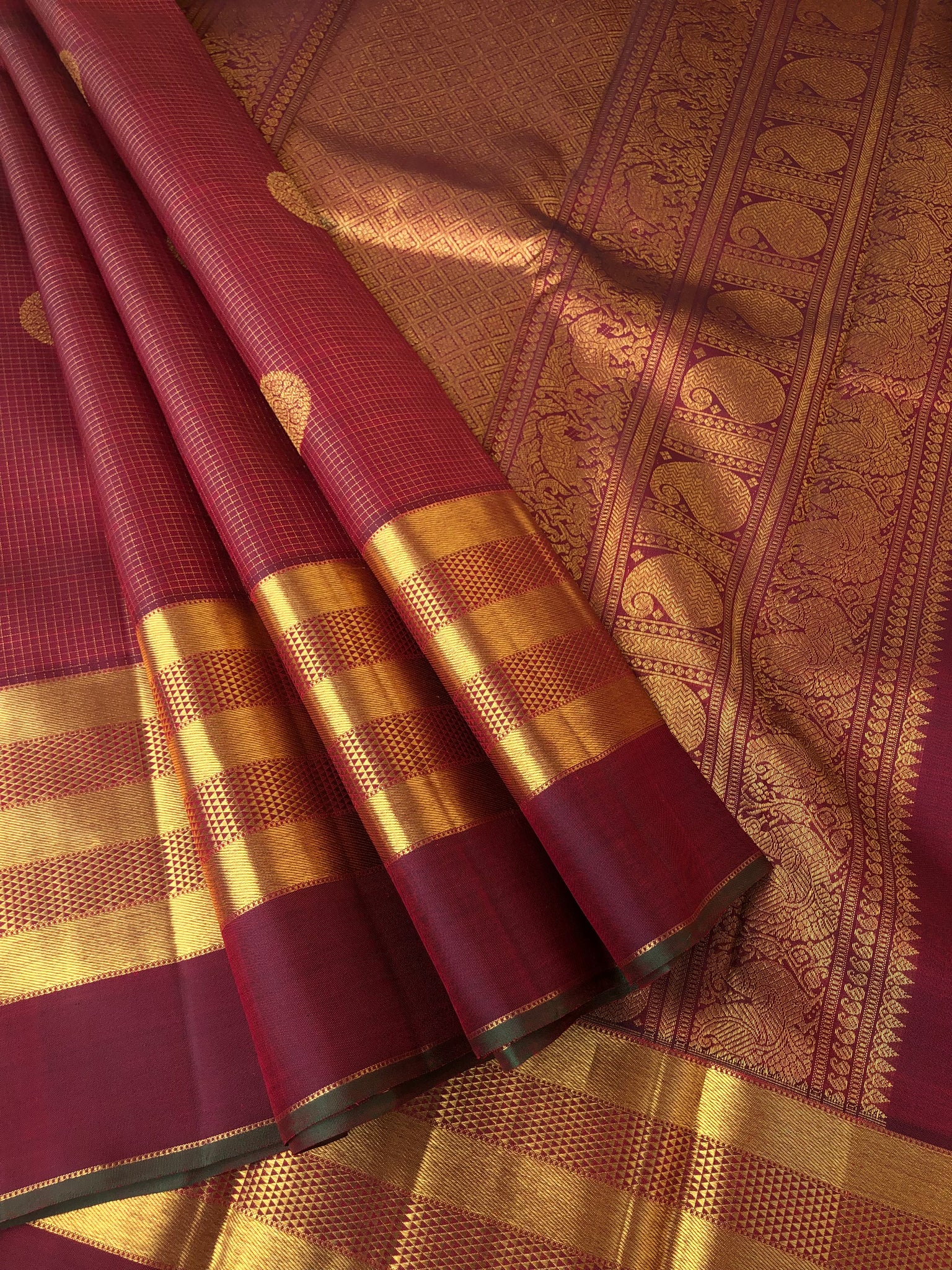 Kamakshi - One of  a Kind Kanchivaram - the grand of grandest aaraku maroon Vairaoosi kattam with chackaram woven buttas on 5 row woven aarai maadam borders