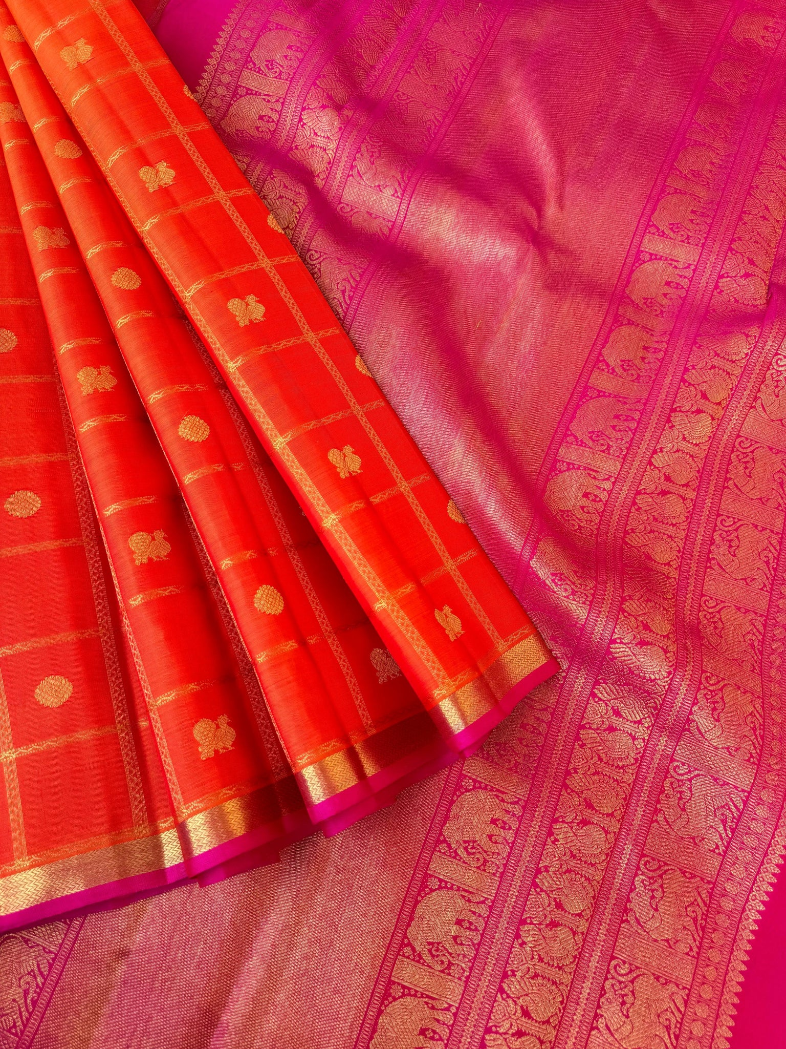 Aandal - The grandeur Kanchivaram - stunning orange and pink veldhari chex mayail chackaram