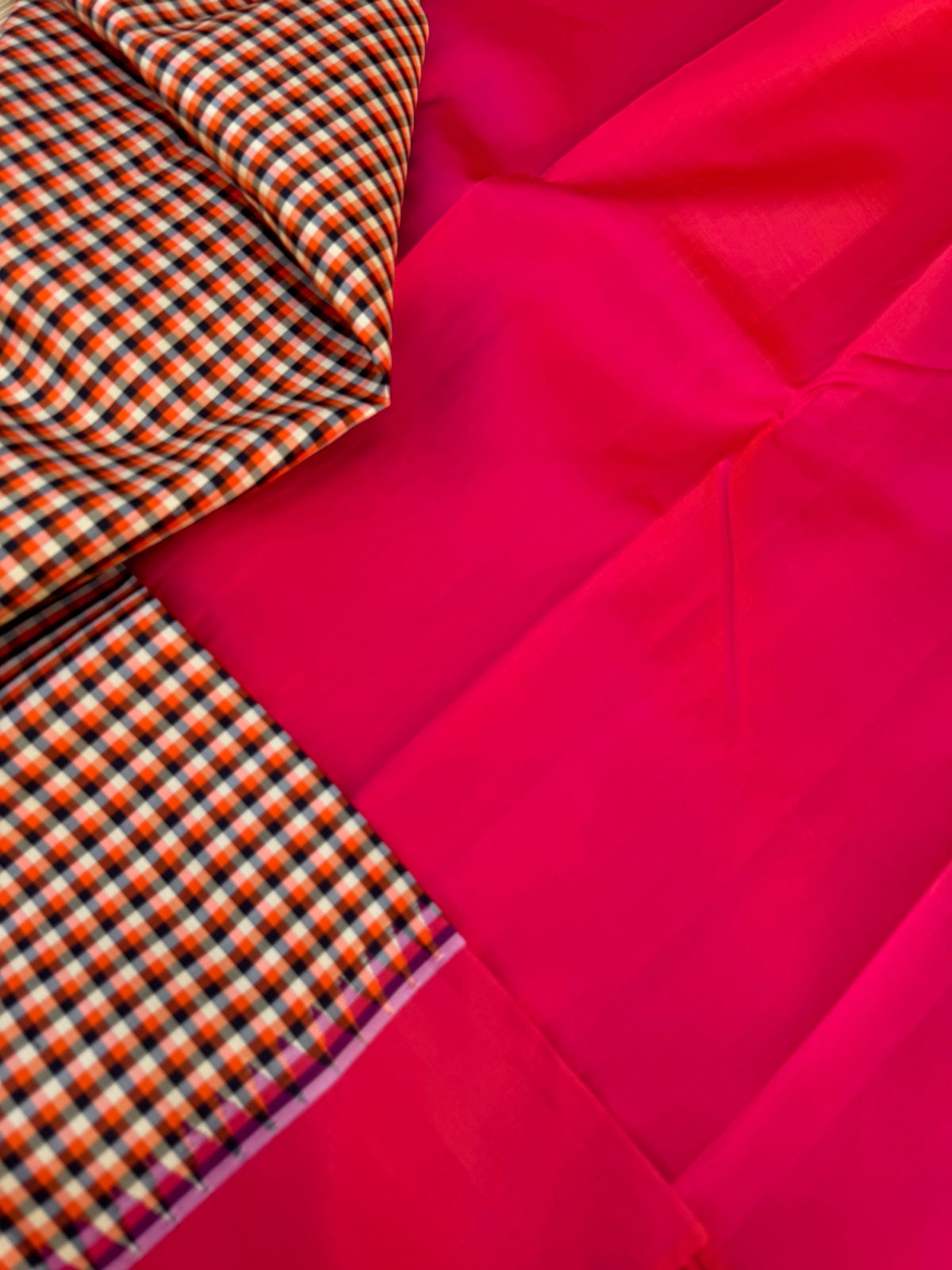 Rarest Korvai Kanchivaram - the body has tiny off white, orange, black chex with orange mixed pink Korvai woven borders