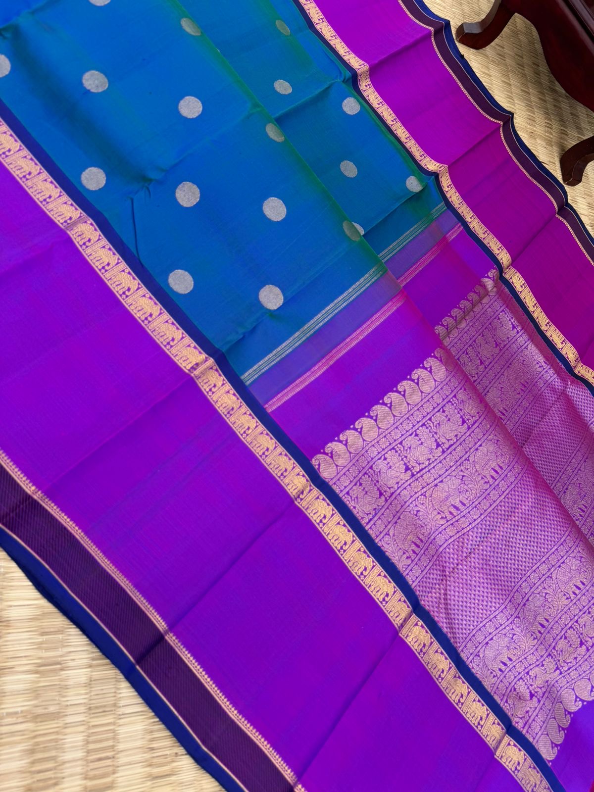 Colour Play on Kanchivaram - stunning peacock blue green dual tone body with violet tone broad woven borders