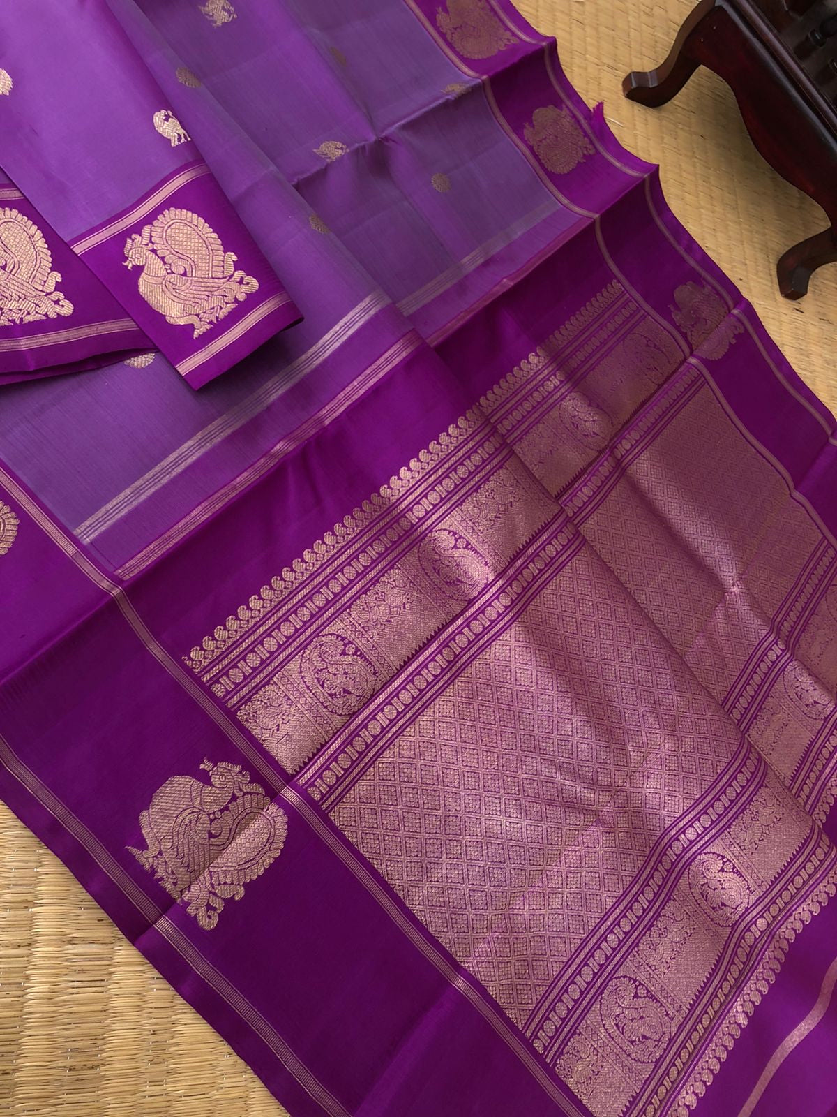 Heriyae - Heirloom Kanchivarams - a stunning metallic violet purple short with annapakshi woven border buttas with yali and chackaram woven body buttas