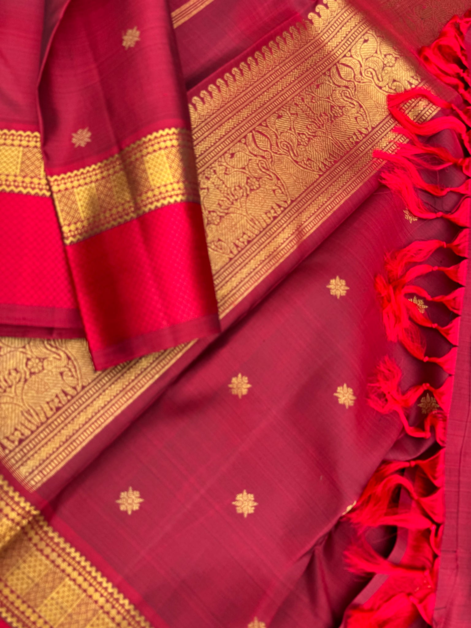 Molten Play on Kanchivaram - deep dark metallic reddish maroon with silk and zari woven borders