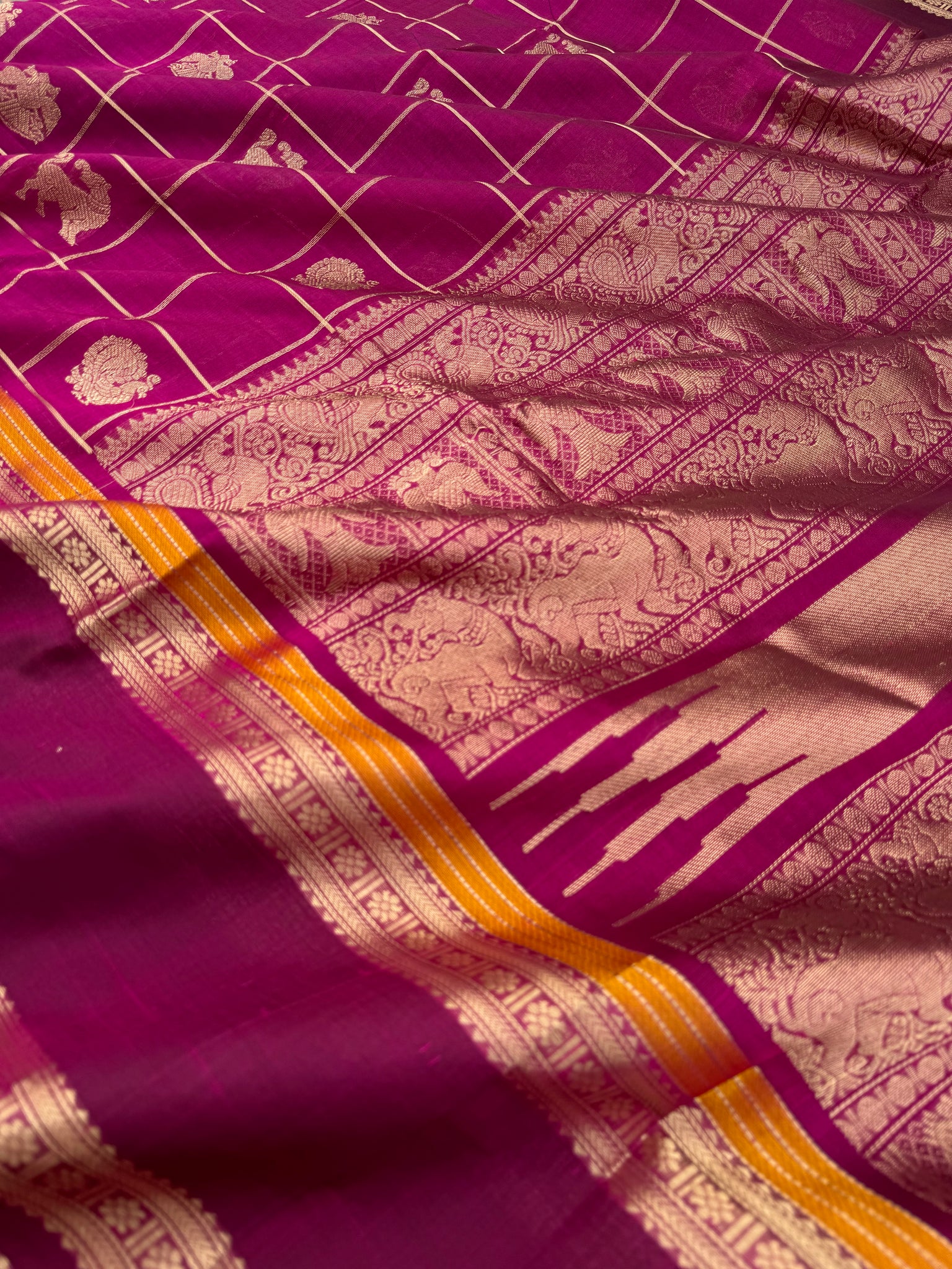 Zari Kissed Silk Cotton - a gorgeous majentha with annam yali and irruthalai pakshi woven buttas