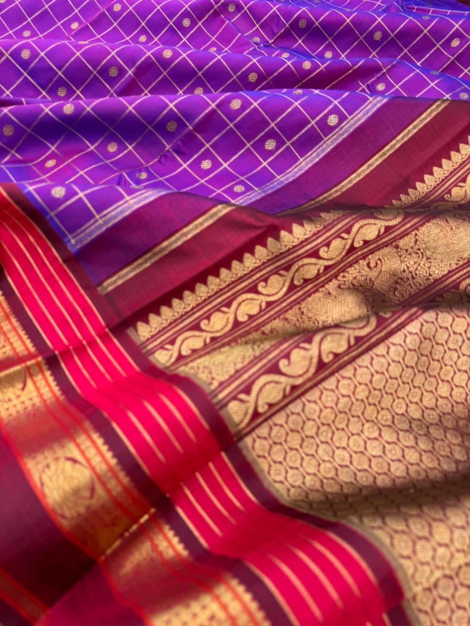Vintage Ragas on Kanchivaram - a dual tone red short violet with all traditional elements of Kanchivaram in one saree !! Kattam buttas moppula everything