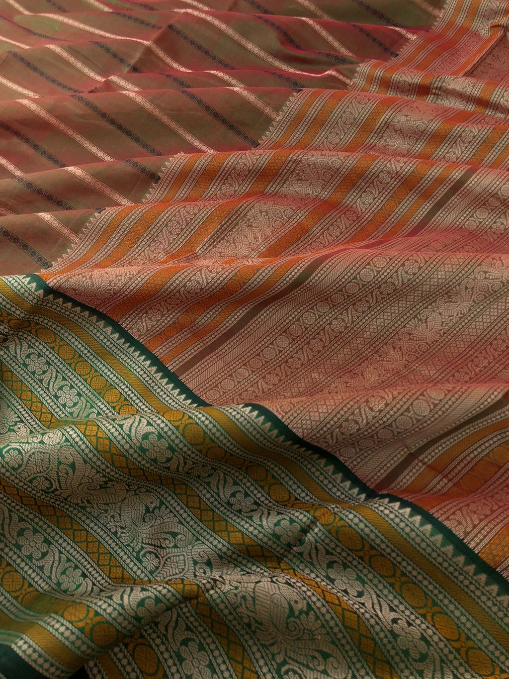 Woven Motifs Silk Cottons - a gorgeous perfect red short green manthulir veldhari with intricate woven borders