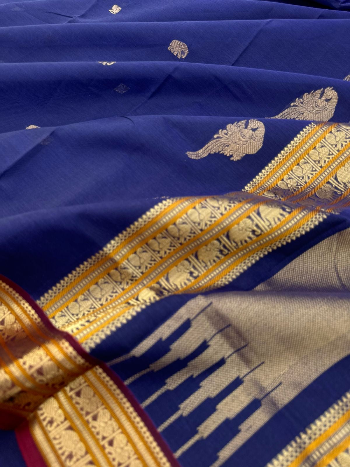 Dark Edition on Zari Kissed Silk Cotton - dark deep blue with one row of parrot woven buttas in the junction of pallu and blouse