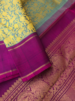 Vanasingaram on Kanchivaram - metallic teal base with mustard silk thread woven vanasingaram with deep dark purple pallu blouse and borders