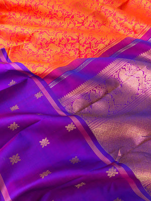 Vanasingaram on Kanchivaram - orangish pink base with mustard vanasingaram woven body with buttas woven borders