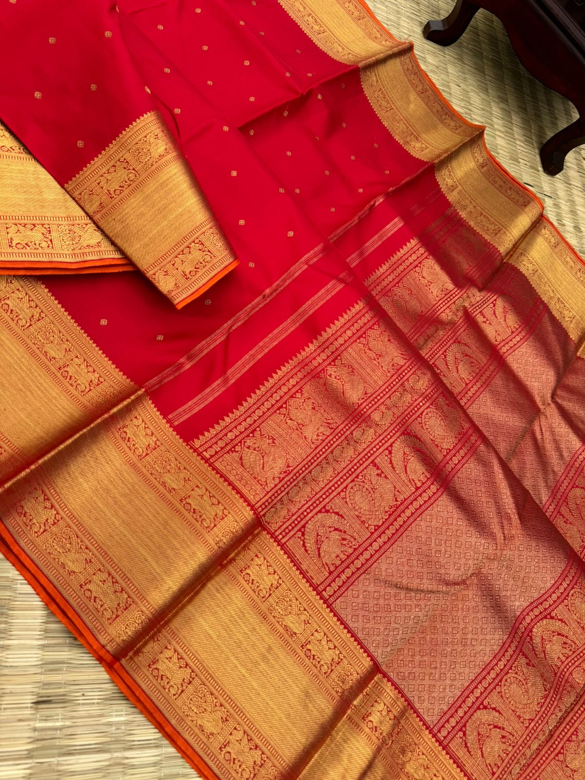 Kamakshi -the gorgeous red and gold with solid gold zari woven borders and pallu