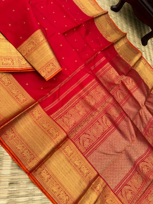 Kamakshi -the gorgeous red and gold with solid gold zari woven borders and pallu