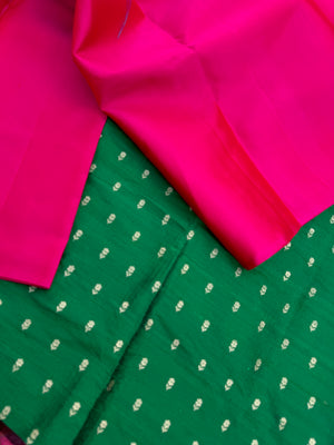 Niram - Celebrating of Full Plain Kanchivaram Silks Paired with Beautiful Blouses - rani pink saree with bottle green raw silk blouse