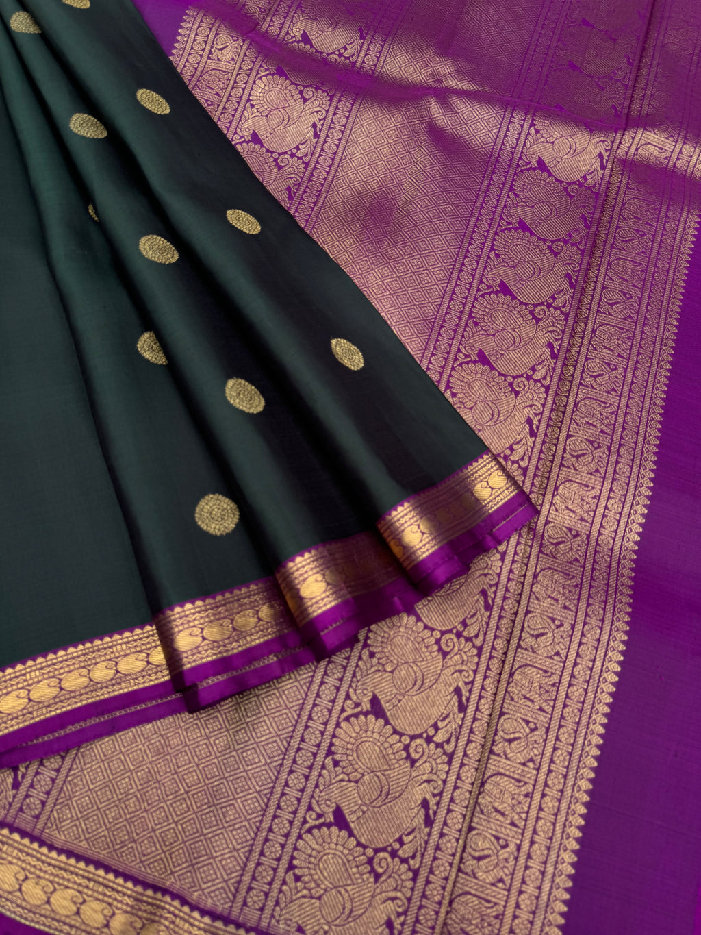 Leela - The bliss of small border Kanchivarams - dark deep intense karum pachai with majentha pallu and blouse