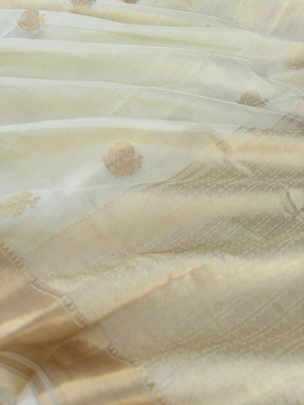Pastels on Zari Kissed Silk Cotton - the most beautiful off white/cream and gold with annapakshi woven buttas