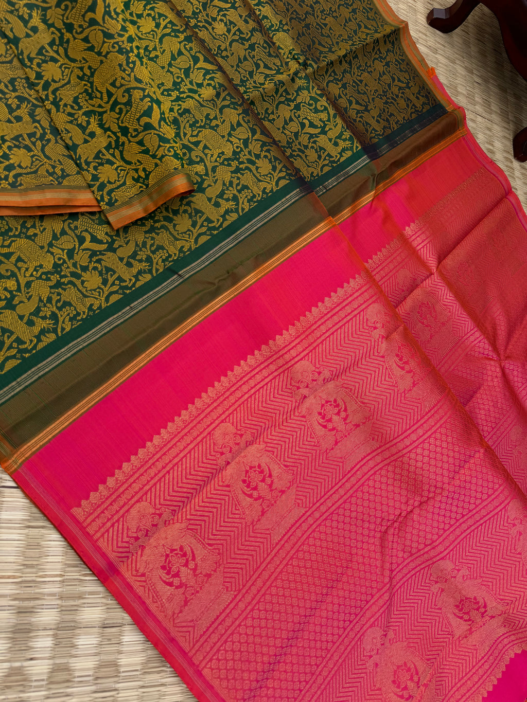 Haritham - Heirloom Yarn Play on Kanchivaram - a stunning deep green base and mustard silk weave vanasingaram with orangish pink dual tone pallu ans blouse