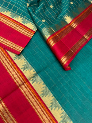 Zari Kissed Silk Cotton - unusual burnt blue with all traditional elements kattam buttas thalampoo retta pett borders