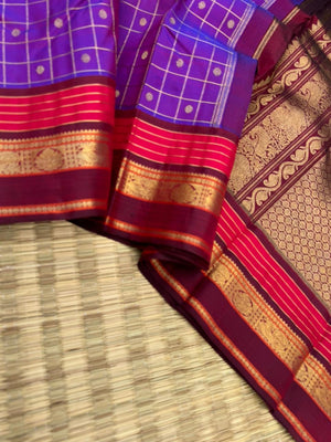 Vintage Ragas on Kanchivaram - a dual tone red short violet with all traditional elements of Kanchivaram in one saree !! Kattam buttas moppula everything