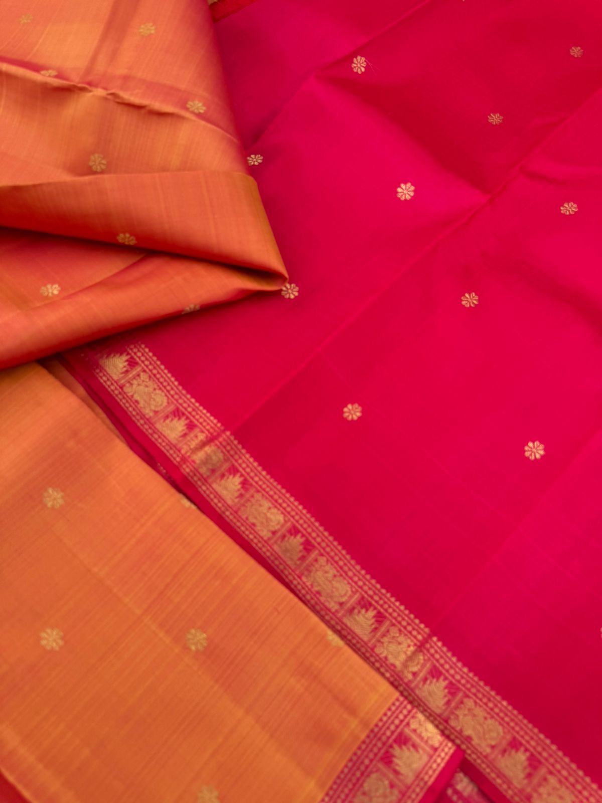 Leela - The bliss of small border Kanchivarams - rusty orange and red with unique buttas woven pallu and blouse