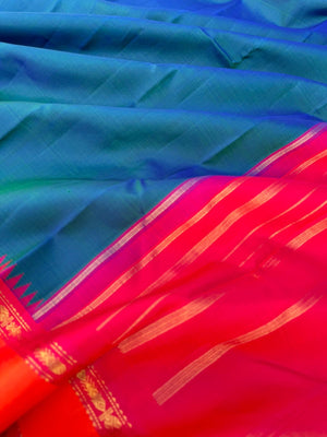 Kamakshi - Heirloom Korvai Kanchivaram - the best of best peacock blue body with orange pink borders and pallu