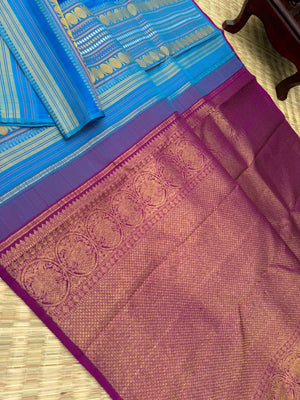 Album Untouched - a deep sulphate blue and deep majenta full body has vertical varusai pett weave one of a kind saree