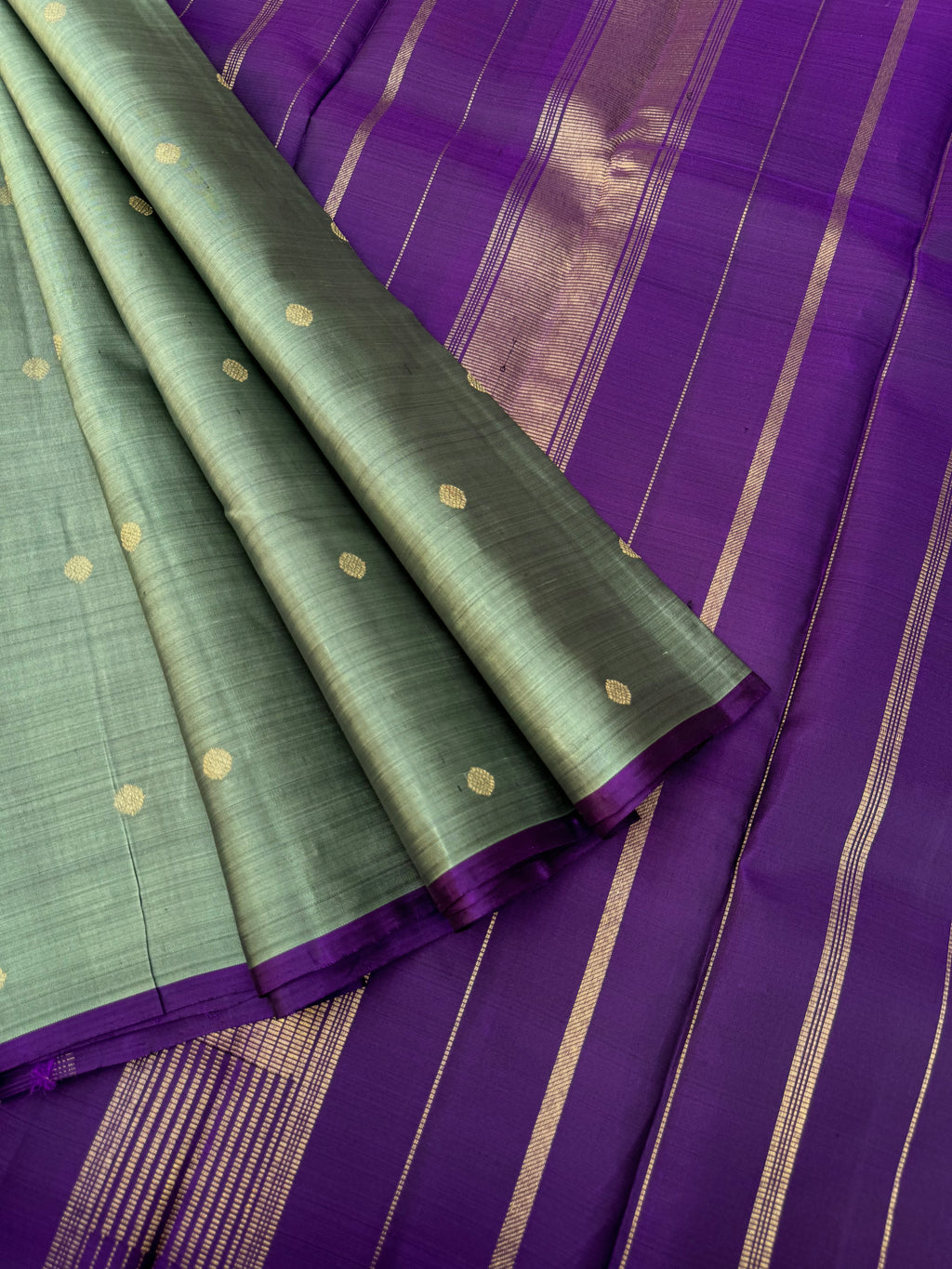 Mohaa - Beautiful Borderless Kanchivarams - a metallic elachi green and deep aubergine simple and elegant Kanchivaram