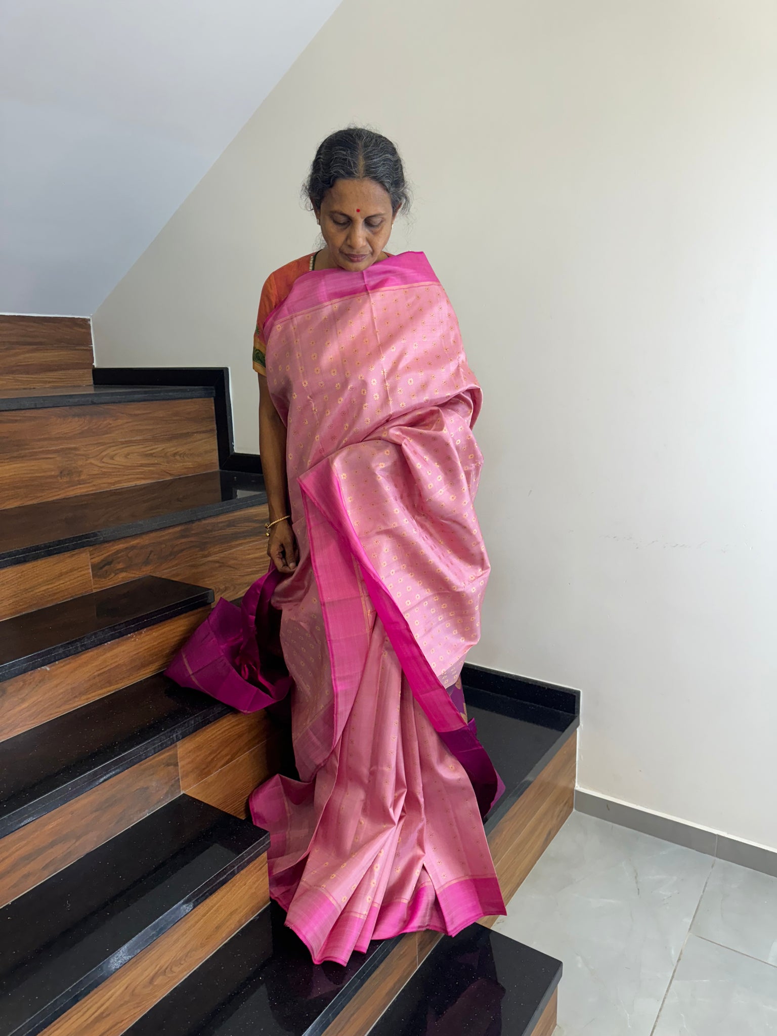 Kanchivaram Concepts - a gorgeous gorgeous baby pink full body meenakari gold zari buttas with majentha pallu and blouse