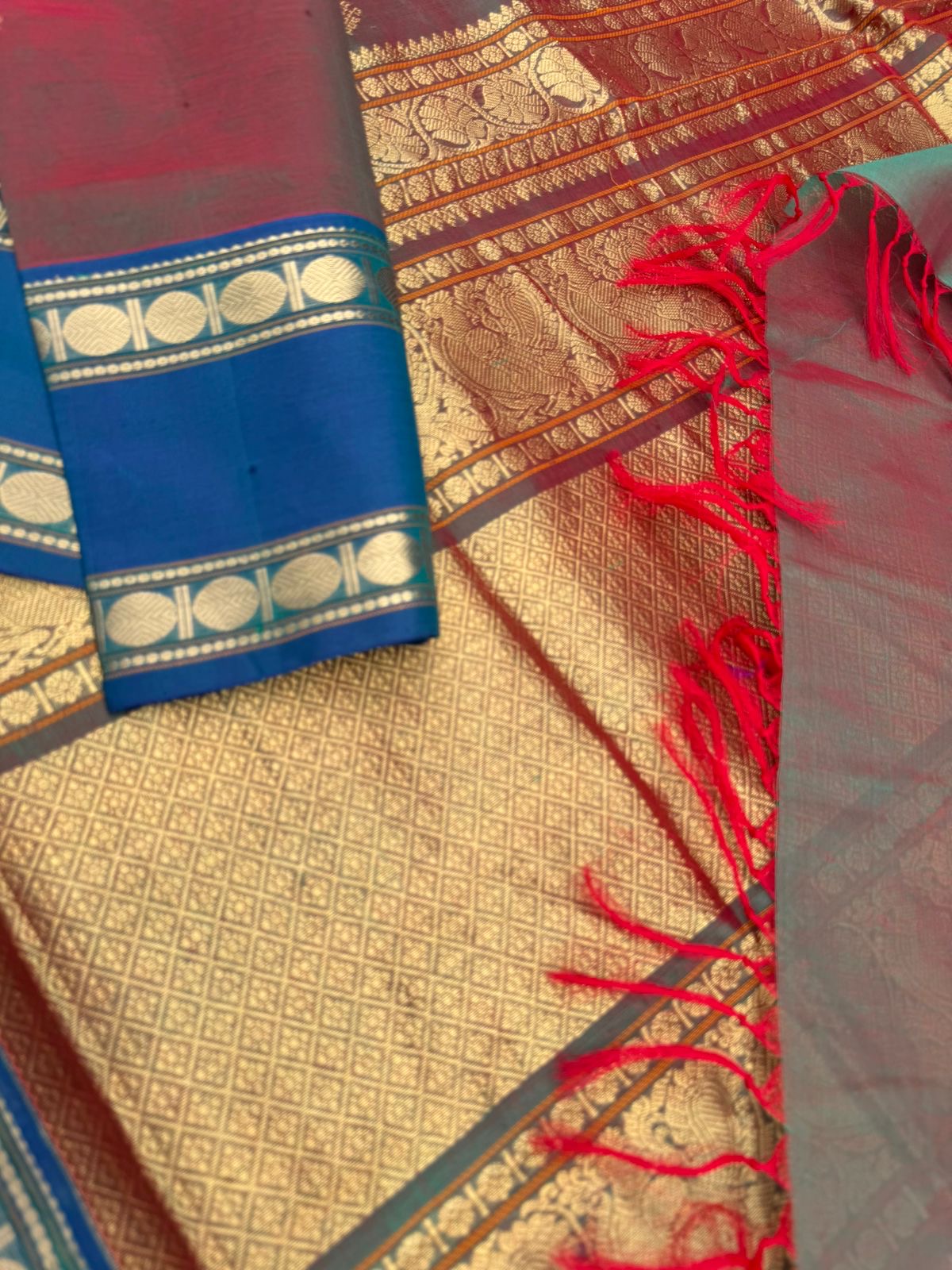 Zari Kissed Silk Cotton - maanthulir tone kolam buttas with peacock blue borders