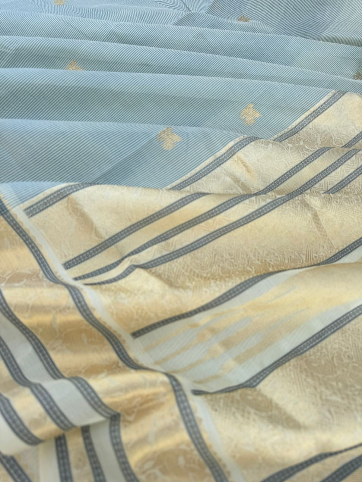 Pastels on Zari Kissed Silk Cotton - the best of best off white and powder blue invisible stripes
