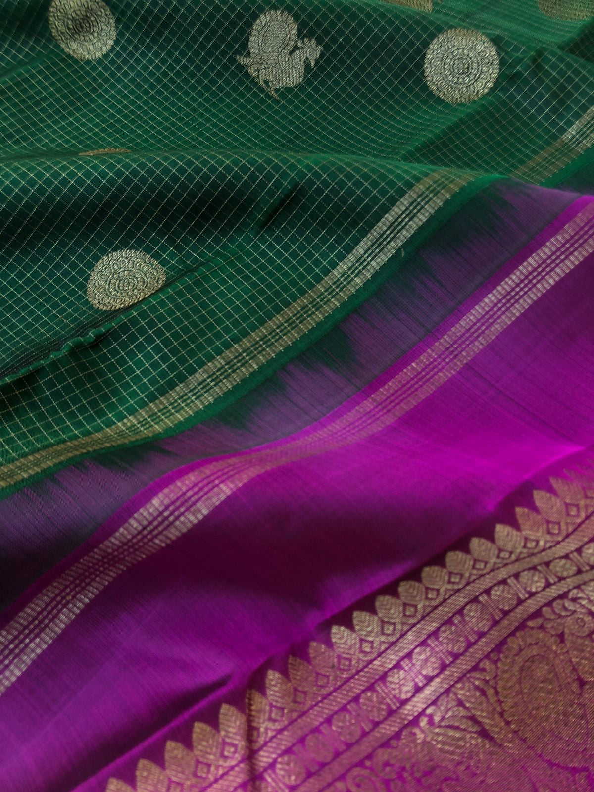 Tara - Traditional Colours on Traditional Kanchivarams - the most beautiful stunning Meenakshi green and majenta pink purple Vairaoosi kattam and mayil chackaram woven body with full gold solid broad borders