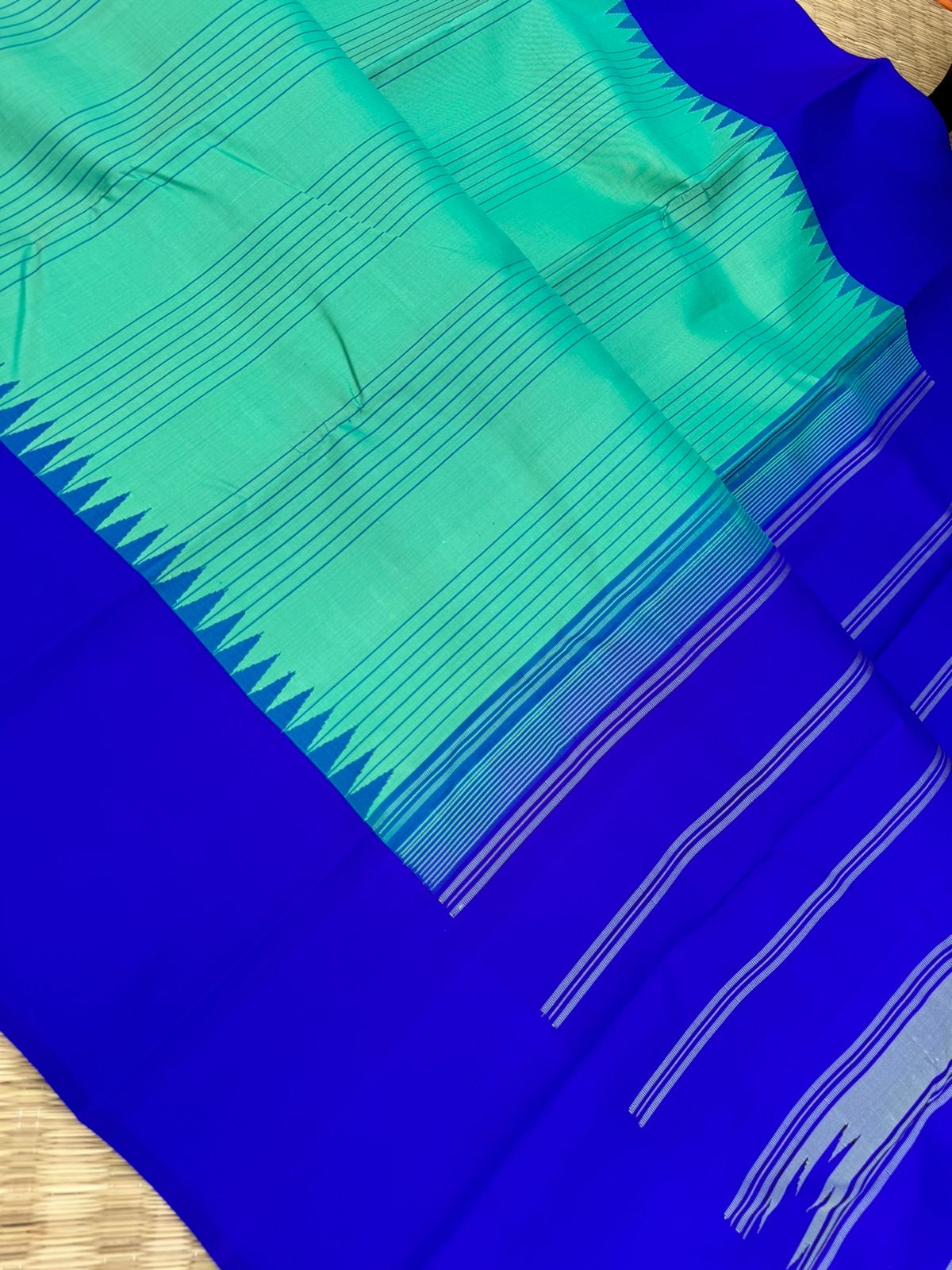 The Best of No Zari Korvai Kanchivaram - a stunning aqua and ms blue with vertical stripes woven body