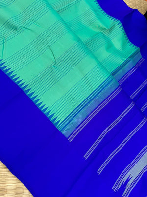 The Best of No Zari Korvai Kanchivaram - a stunning aqua and ms blue with vertical stripes woven body