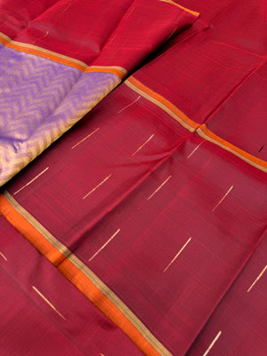Tasteful Tall Border Kanchivarams - stunning lavender and gold Chevron V woven body with deep red long korvai woven borders with raindrops weave