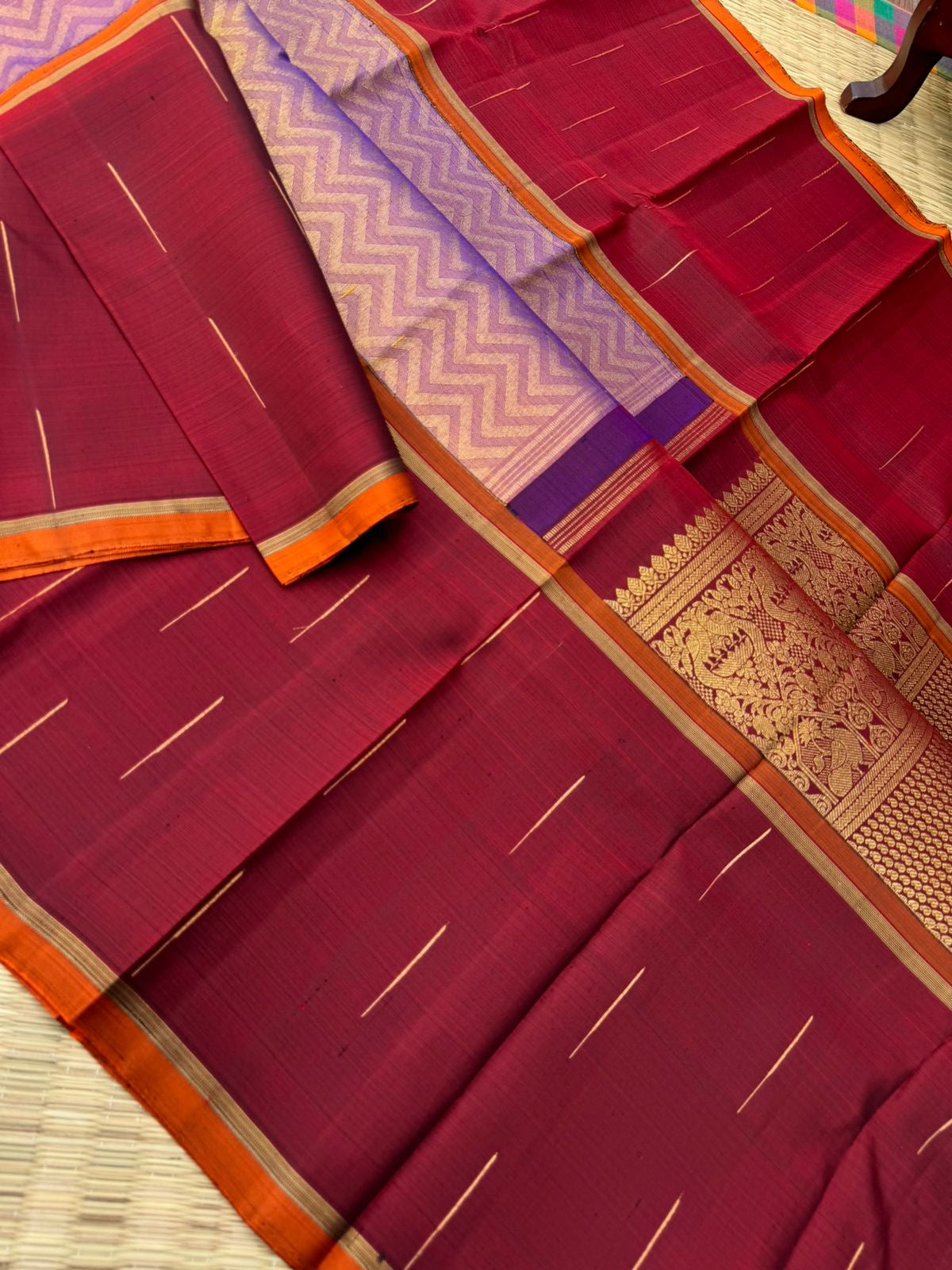 Tasteful Tall Border Kanchivarams - stunning lavender and gold Chevron V woven body with deep red long korvai woven borders with raindrops weave