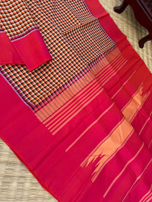 Rarest Korvai Kanchivaram - the body has tiny off white, orange, black chex with orange mixed pink Korvai woven borders