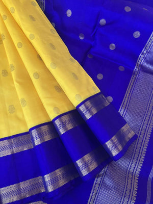 Meenakshi - Kanchivaram for Every Occasion - lovely lemon yellow and ms blue korvai Kanchivaram