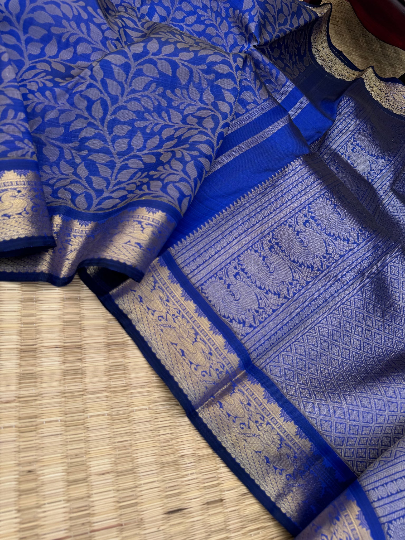 Haritham - Heirloom Yarn Play on Kanchivaram - stunning royal blue with full body woven leaves with gold zari woven borders and pallu