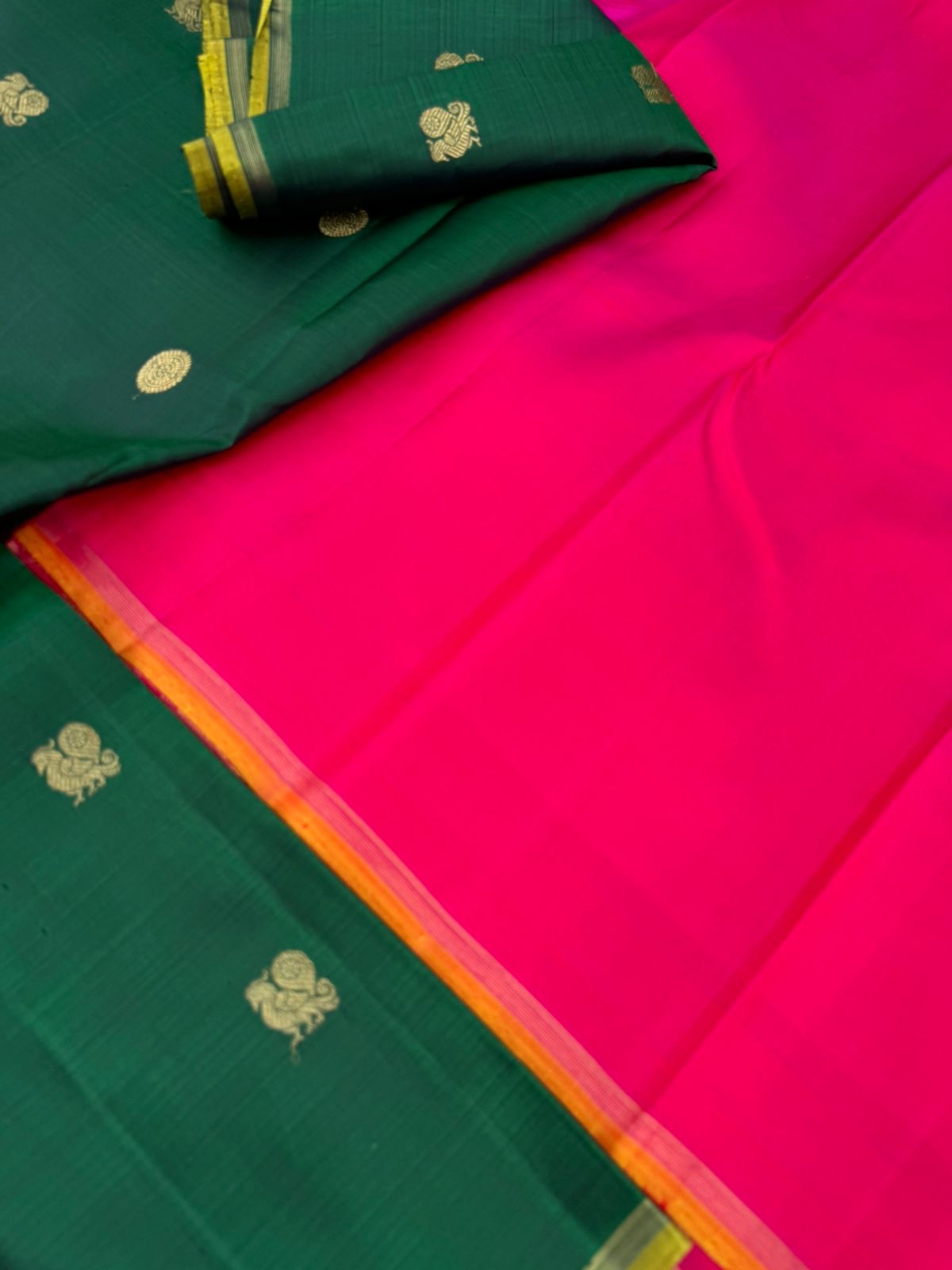 Colour Play on Kanchivaram - deep dark Meenakshi green and pink borderless Kanchivaram