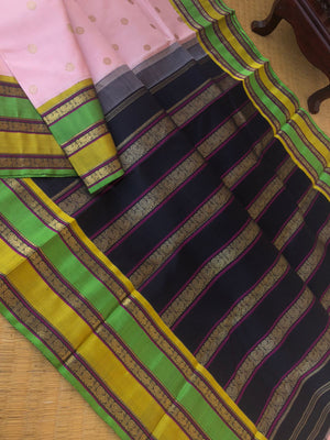 Meenakshi Kalayanam - Authentic Korvai Kanchivarams - the best of best pastel pale pink with stunning dual colour woven borders with black pallu and blouse